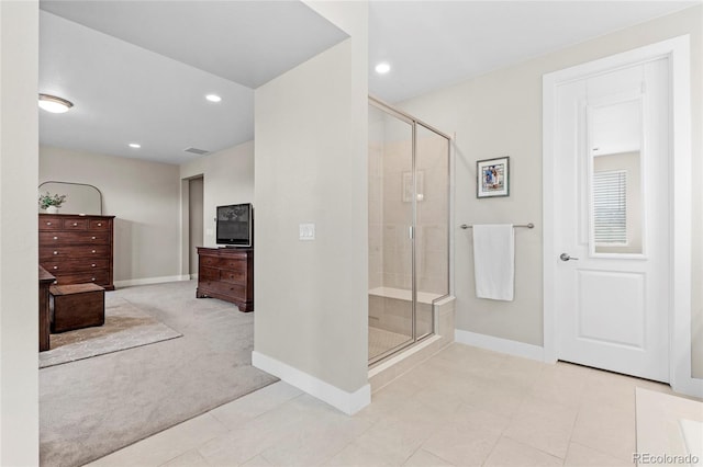 bathroom with a stall shower, visible vents, baseboards, and recessed lighting