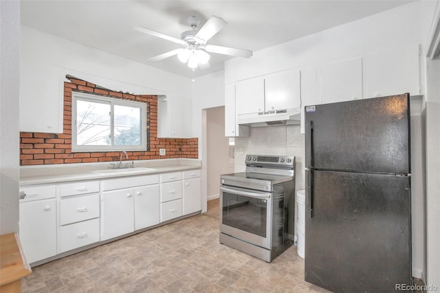 kitchen featuring sink, black refrigerator, electric stove, decorative backsplash, and white cabinets