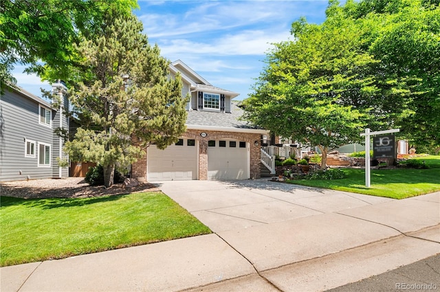 9916 Spring Hill Ln, Highlands Ranch, CO 80129 - view of front of property with brick siding, driveway, a garage, a front lawn, and a shingled roof