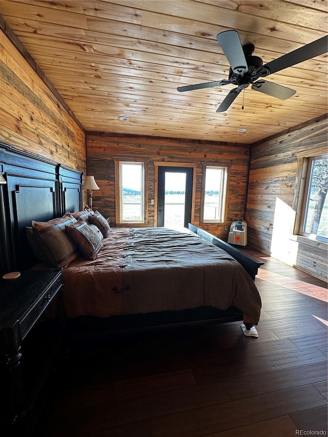 bedroom featuring wood-type flooring, ceiling fan, and wooden ceiling