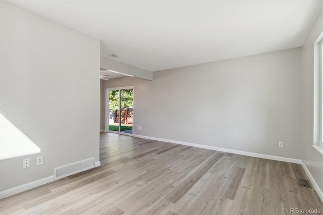 unfurnished room with ceiling fan and light hardwood / wood-style flooring