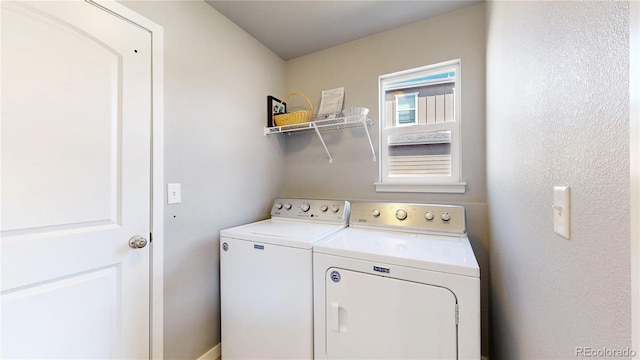 laundry room featuring laundry area and washer and dryer