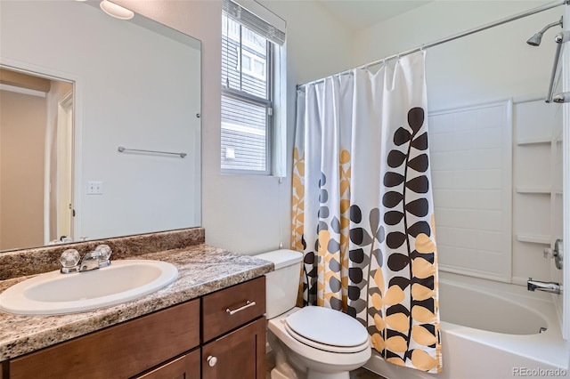 4625 Walden Ct, Denver, CO 80249 - bathroom featuring toilet, vanity, and shower / bath combo with shower curtain