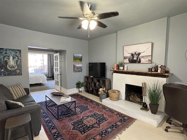 living room featuring ceiling fan