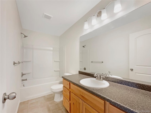 8612 13th St, Greeley, CO 80634 - bathroom with bathing tub / shower combination, toilet, visible vents, tile patterned flooring, and vanity