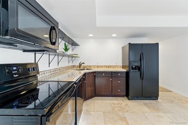 kitchen with open shelves, recessed lighting, a sink, black appliances, and dark brown cabinets