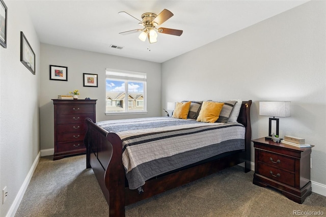 carpeted bedroom featuring visible vents, ceiling fan, and baseboards