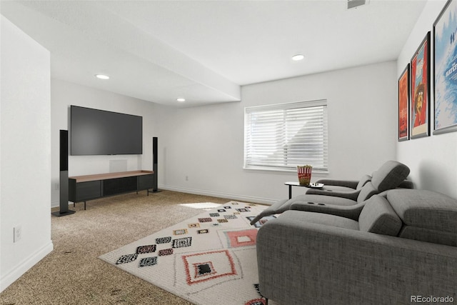 living area featuring recessed lighting, baseboards, and carpet flooring