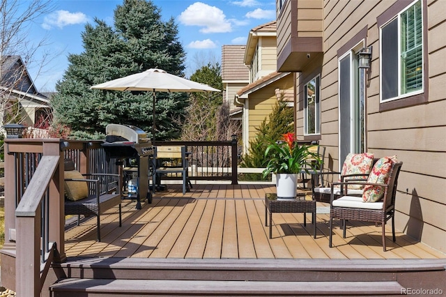 deck featuring grilling area