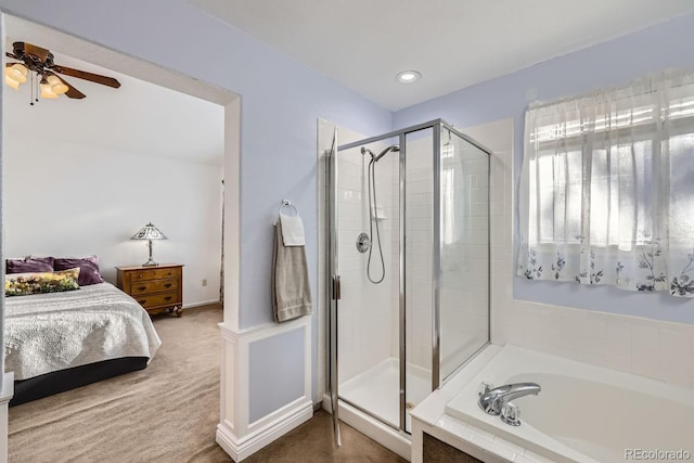 bathroom with shower with separate bathtub and ceiling fan