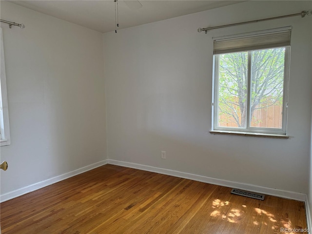 5618 Carr St, Arvada, CO 80002 - empty room featuring baseboards and wood finished floors