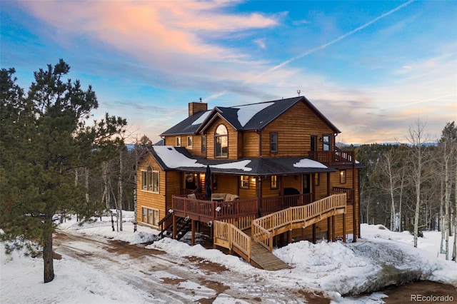 view of snow covered property