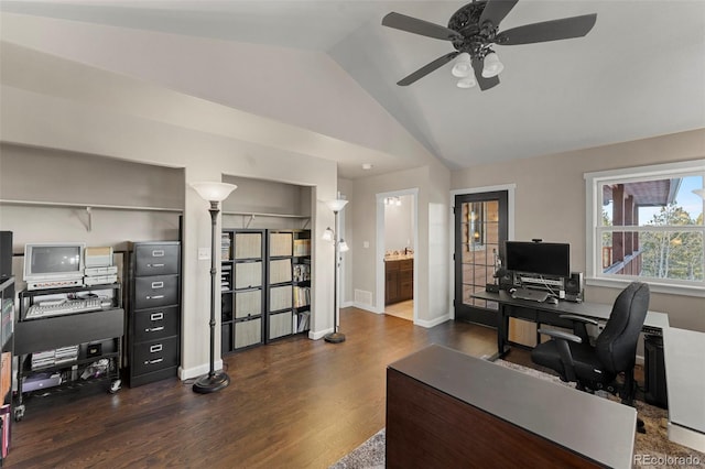 home office with dark hardwood / wood-style floors, vaulted ceiling, and ceiling fan