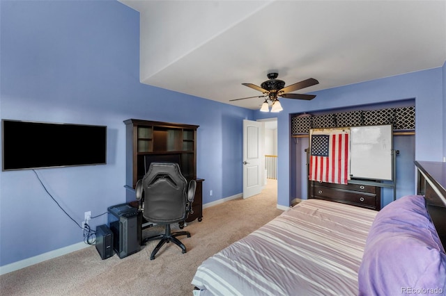 carpeted bedroom with ceiling fan