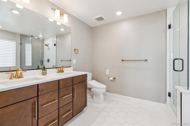 full bath featuring a sink, visible vents, and a shower stall