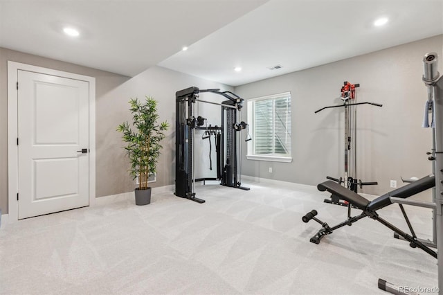 exercise area with recessed lighting, carpet flooring, visible vents, and baseboards