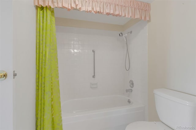 full bathroom with toilet and shower / tub combo with curtain