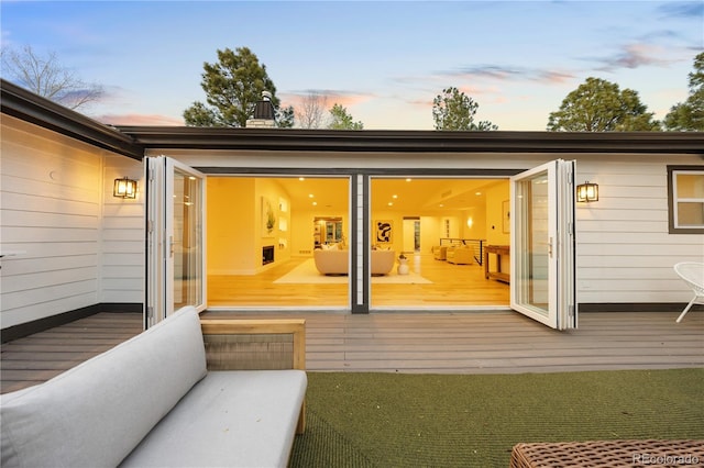 rear view of house with an outdoor hangout area