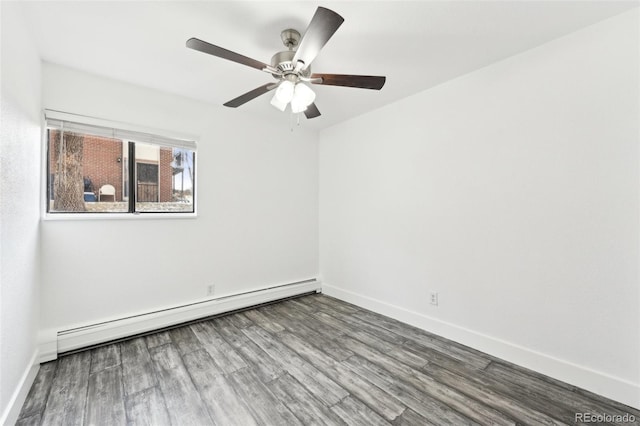 empty room with ceiling fan, hardwood / wood-style floors, and a baseboard heating unit