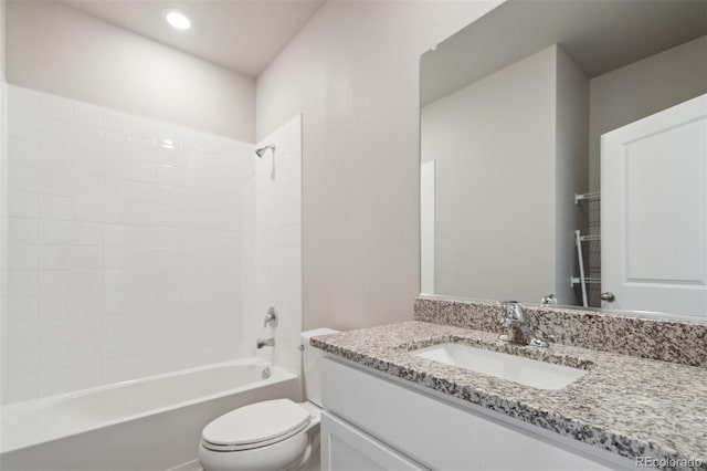 full bathroom featuring shower / bathing tub combination, vanity, and toilet