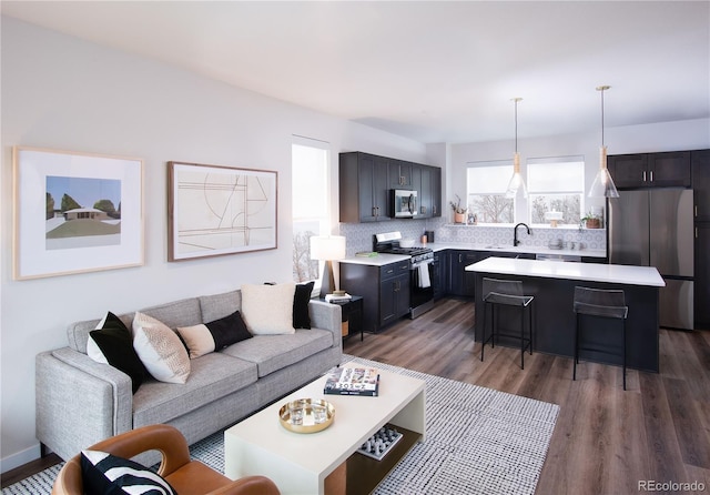 11914 W 57th Dr, Arvada, CO 80002 - living area with wood finished floors