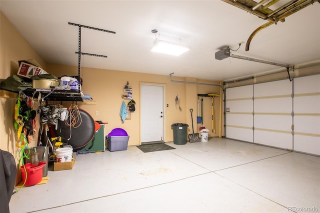 garage featuring a garage door opener