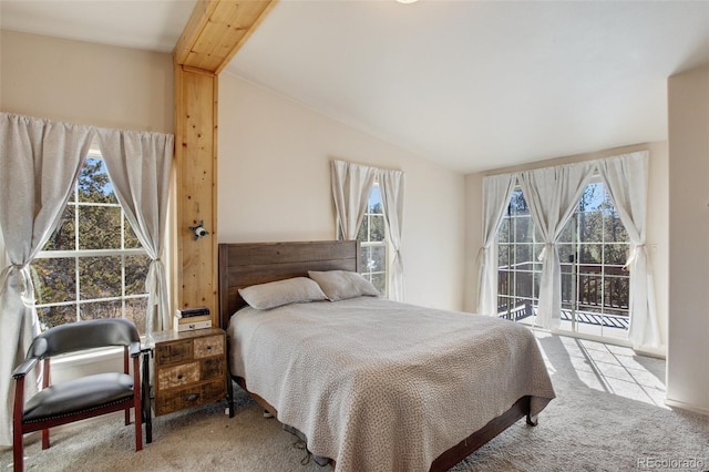 carpeted bedroom featuring access to exterior, multiple windows, and vaulted ceiling with beams