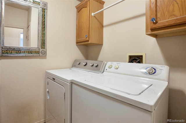 laundry area with cabinet space and washing machine and dryer