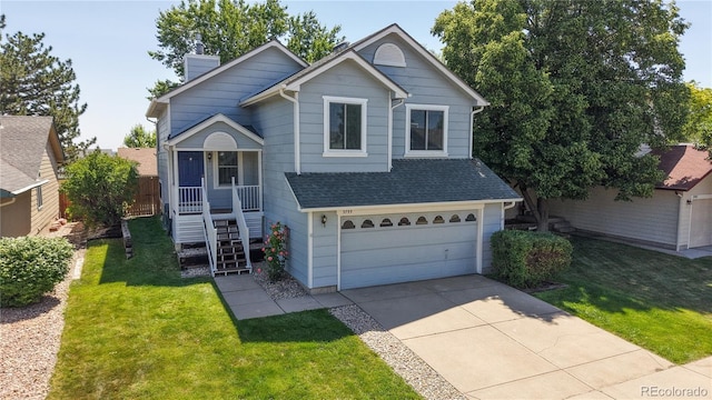 3755 Shefield Dr, Broomfield, CO 80020 - view of front facade with concrete driveway, a chimney, a garage, and a front yard