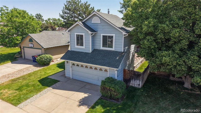 3755 Shefield Dr, Broomfield, CO 80020 - traditional-style home featuring a shingled roof and driveway