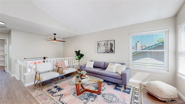 3755 Shefield Dr, Broomfield, CO 80020 - living room with wood finished floors, a ceiling fan, and vaulted ceiling
