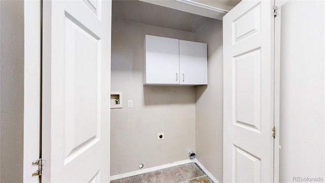 3755 Shefield Dr, Broomfield, CO 80020 - washroom featuring cabinet space, hookup for an electric dryer, hookup for a washing machine, and gas dryer hookup