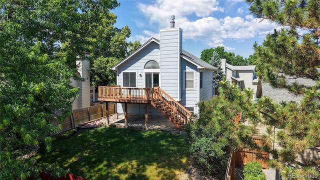3755 Shefield Dr, Broomfield, CO 80020 - back of property featuring stairway, a wooden deck, and a chimney