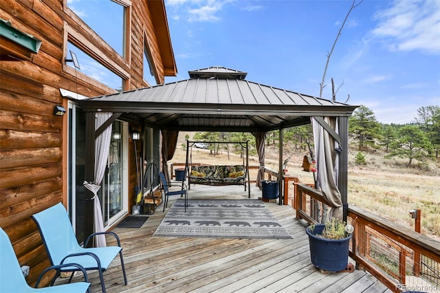 wooden deck with a gazebo