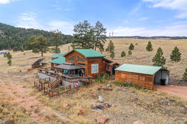 birds eye view of property with a rural view