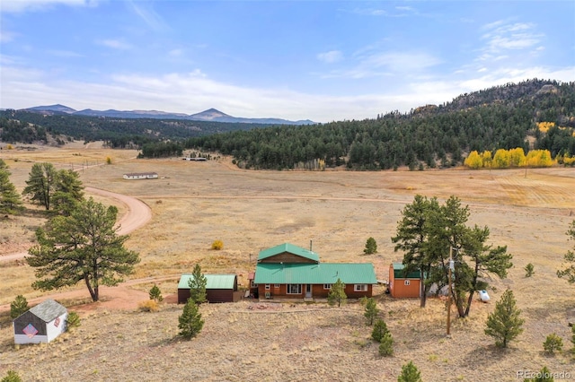 aerial view with a mountain view and a rural view