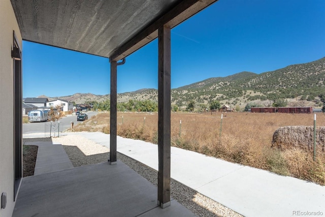 view of patio featuring a mountain view