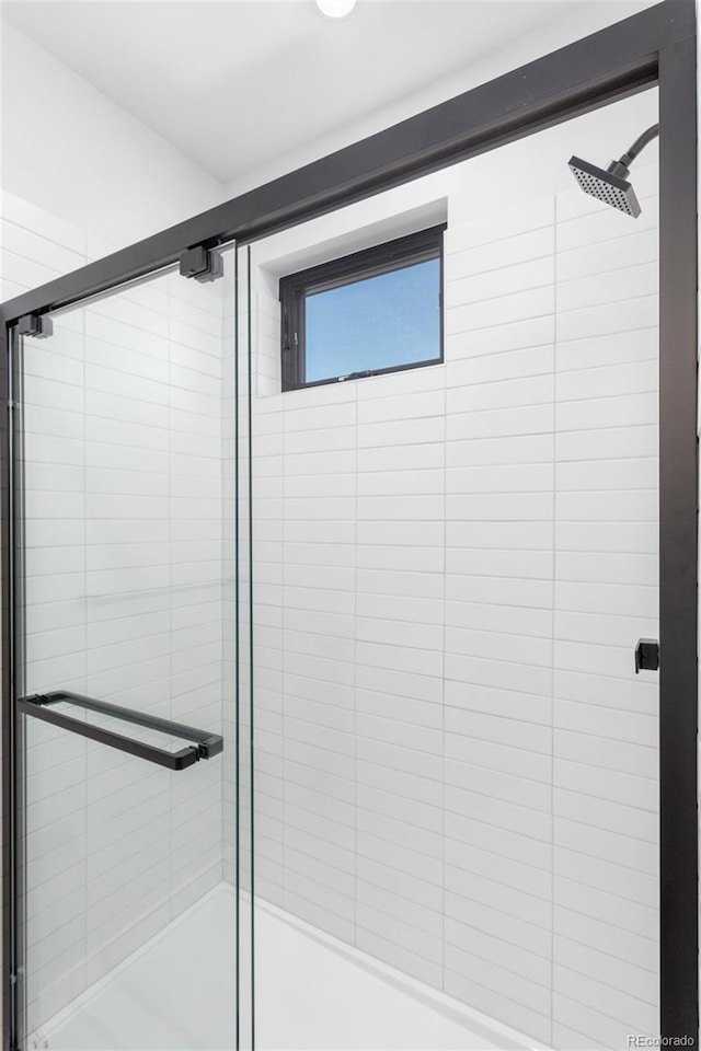 bathroom with an enclosed shower