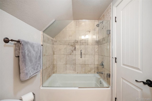 3629 Kalamath St, Denver, CO 80211 - bathroom featuring a textured ceiling and bath / shower combo with glass door