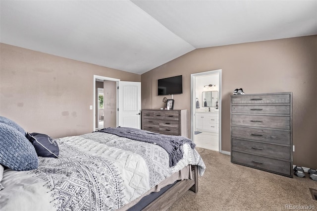 6062 S Newport St, Centennial, CO 80111 - bedroom with vaulted ceiling, light carpet, and connected bathroom