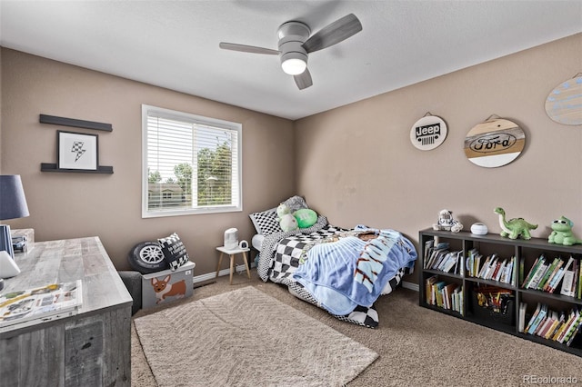 6062 S Newport St, Centennial, CO 80111 - carpeted bedroom with baseboards and a ceiling fan