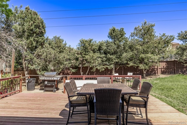 6062 S Newport St, Centennial, CO 80111 - wooden deck featuring a grill and outdoor dining space