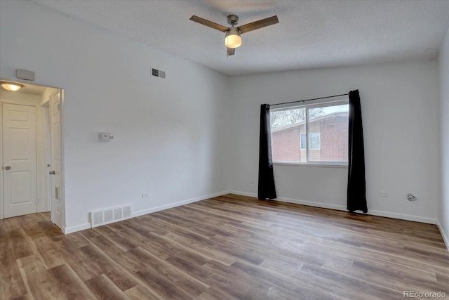 2938 Eliot Cir, Westminster, CO 80030 - empty room featuring a ceiling fan, wood finished floors, baseboards, and a textured ceiling