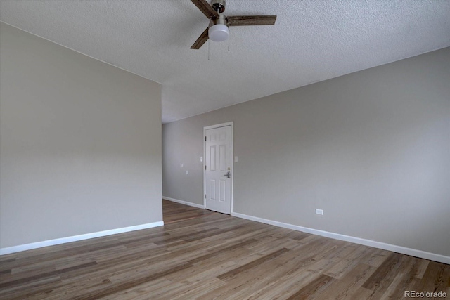 2938 Eliot Cir, Westminster, CO 80030 - empty room with ceiling fan, wood finished floors, a textured ceiling, and baseboards