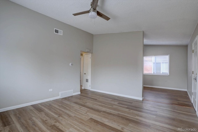 2938 Eliot Cir, Westminster, CO 80030 - empty room with a ceiling fan, wood finished floors, a textured ceiling, and baseboards