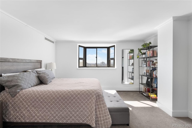 carpeted bedroom with baseboards, visible vents, and crown molding