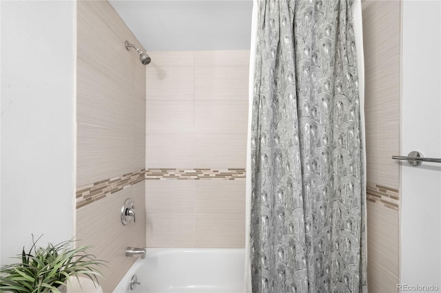 bathroom featuring shower / bath combination with curtain