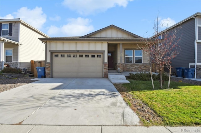 view of front of home with a garage and a front yard