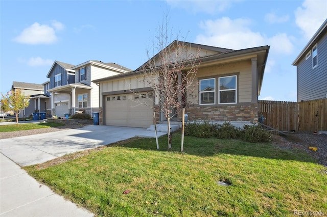 view of front of property featuring a garage and a front lawn