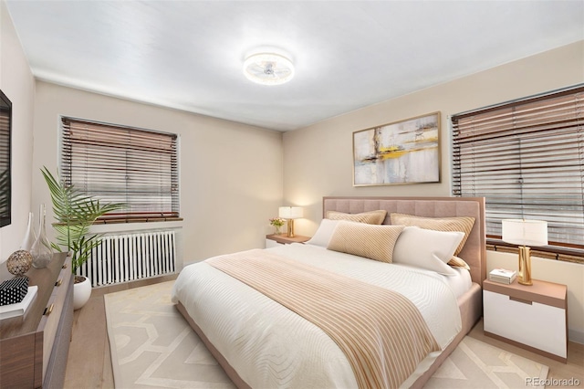 bedroom featuring radiator heating unit